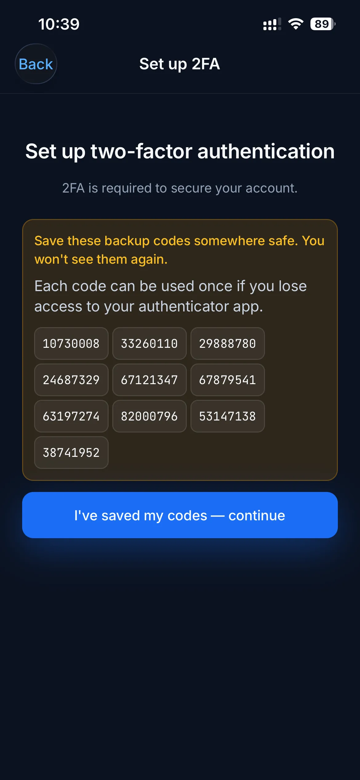The backup codes screen, with a grid of one-time codes and an I've saved my codes — continue button.